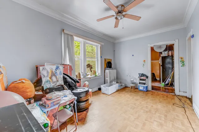 a bedroom with furniture and a window