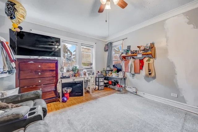 a children room with toys and flat screen tv