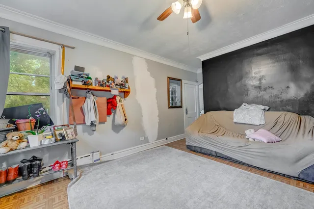 a bedroom with bed and a window