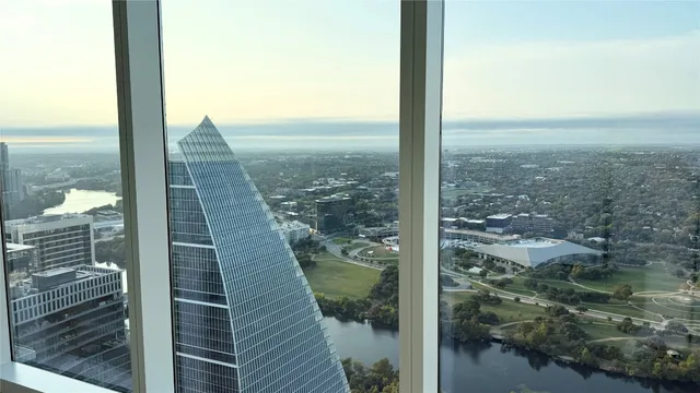 a view of a balcony next to a lake view