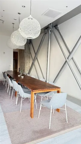 a hotel room with furniture and a couch