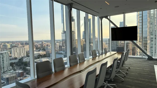 a view of roof deck with seating space and barbeque oven