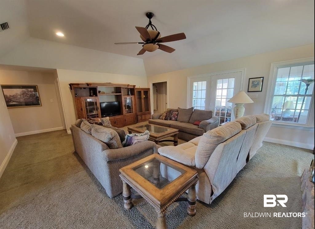 16311 Old Brady Road Bay Minette, AL 36507 - Photo 3 of 38 Spacious living area featuring a vaulted ceiling with a ceiling fan, recessed lighting, and light-colored wall paint