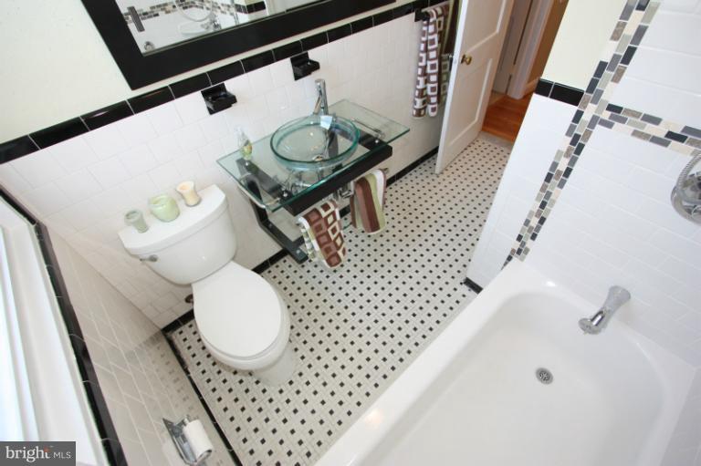 923 Masefield Road Baltimore, MD 21207 - Photo 3 of 30 Glass bowl sink with full shelf underneath