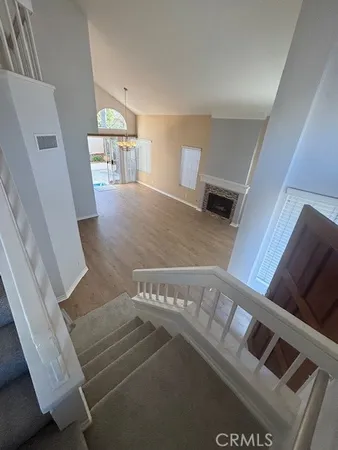 a view of a livingroom with wooden floor