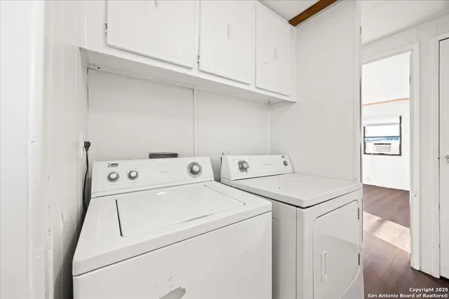 a utility room with dryer and washer