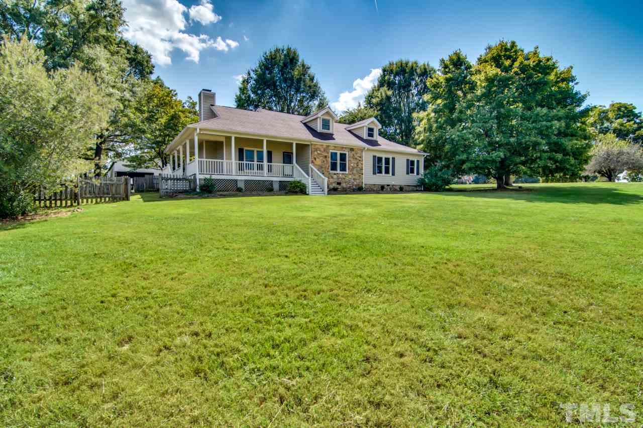 415 Bill Poole Road Rougemont, NC 27572 - Photo 2 of 30 Covered, wrap around porch
