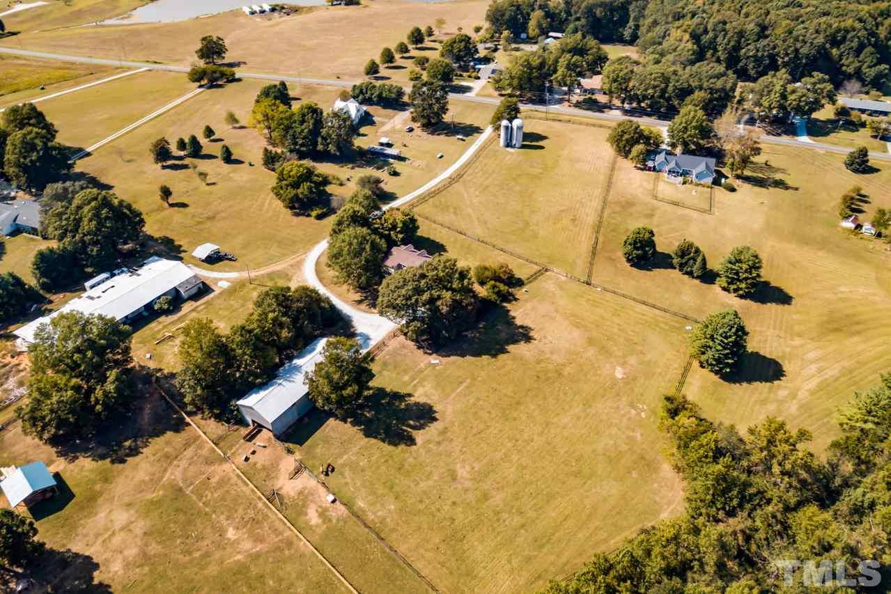415 Bill Poole Road Rougemont, NC 27572 - Photo 29 of 30 Extends from driveway back to fence behind barn