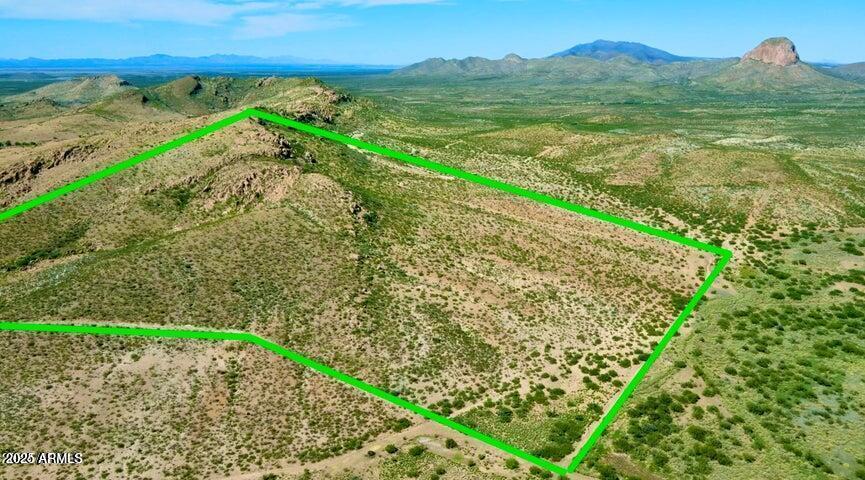 Tbd North Morning Star Trail Douglas, AZ 85607 - Photo 1 of 36 a view of a lake with a mountain