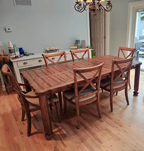 a kitchen with granite countertop a stove a sink and a granite counter tops