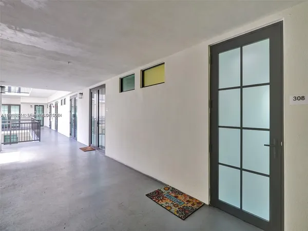 a view of entryway with stairs