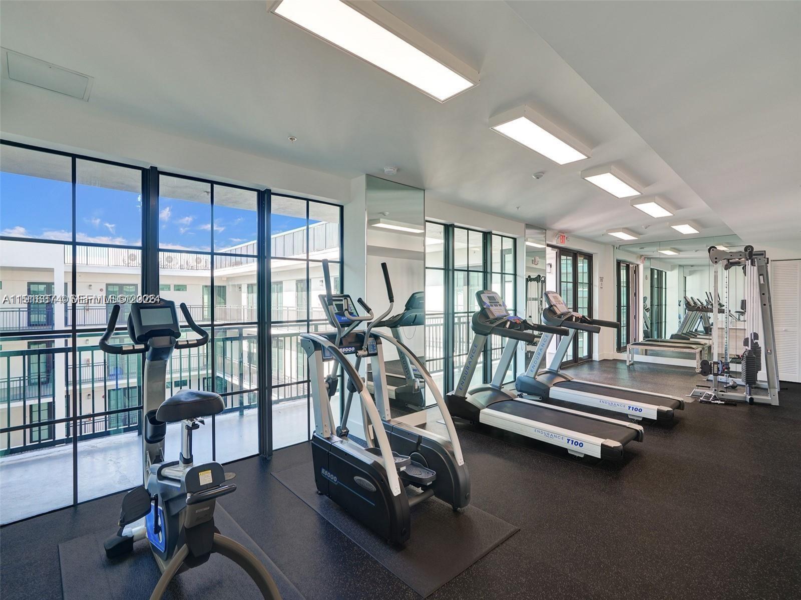 4100 Southwest 64th Avenue, Unit 308 Davie, FL 33314 - Photo 28 of 41 a view of a room with gym equipment