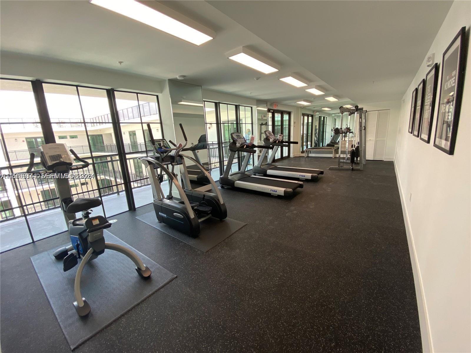 4100 Southwest 64th Avenue, Unit 308 Davie, FL 33314 - Photo 29 of 41 a view of a room with gym equipment