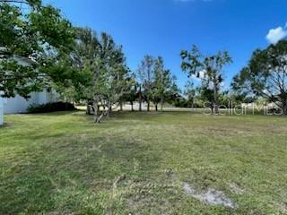 310 West Henry Street Punta Gorda, FL 33950 - Photo 13 of 24 a view of a field with trees