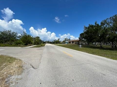 310 West Henry Street Punta Gorda, FL 33950 - Photo 3 of 24 a view of a golf course with a yard