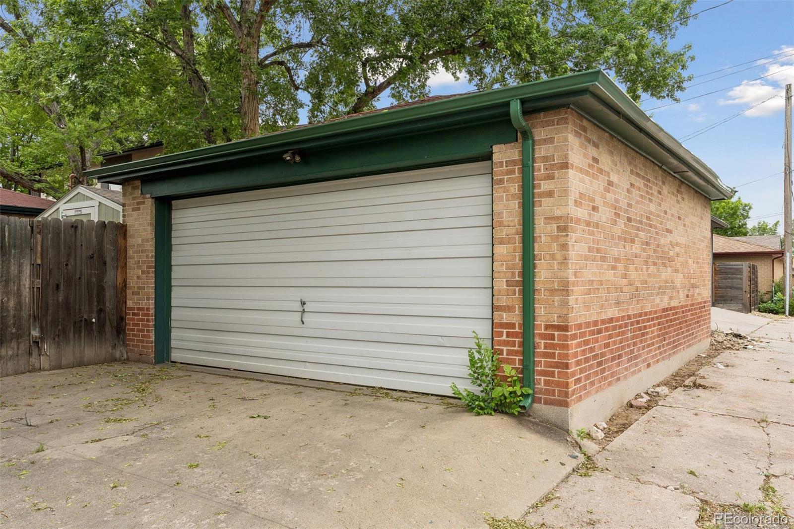 2255 Meade Street Denver, CO 80211 - Photo 23 of 30 a side view of a house with a garage