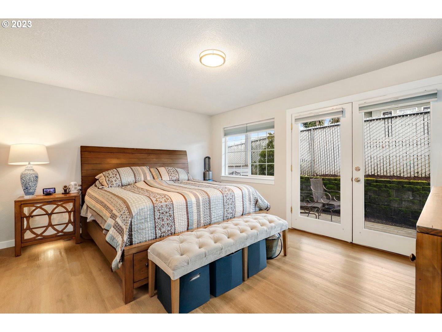 4114 Nicholson Road Vancouver, WA 98661 - Photo 16 of 28 a bedroom with a large bed and a tv