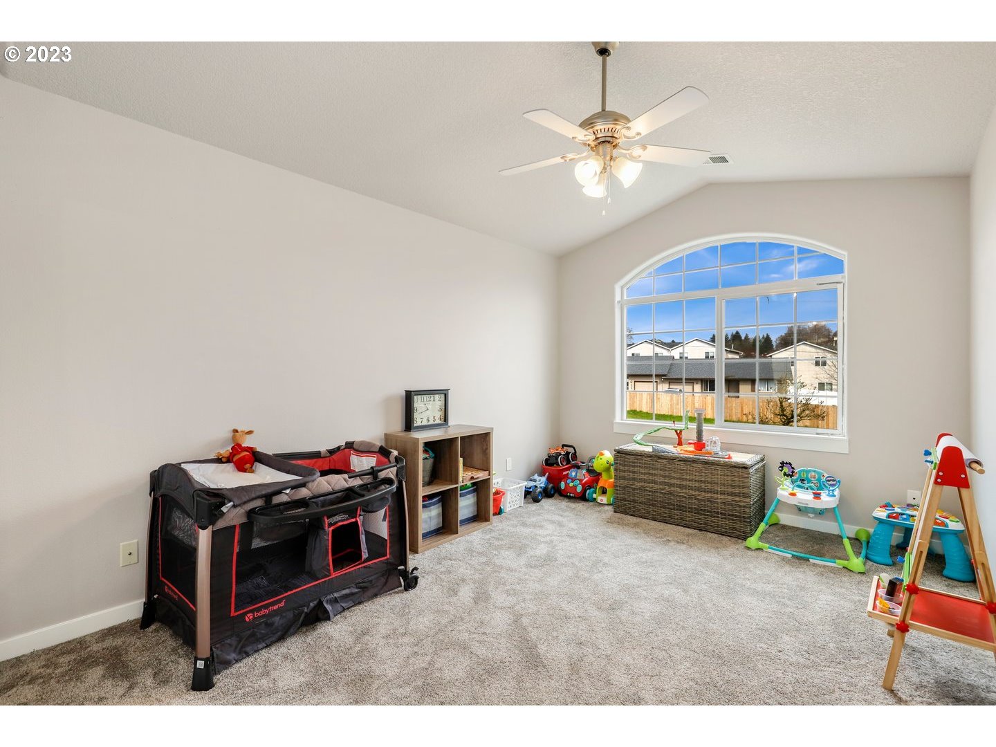 4114 Nicholson Road Vancouver, WA 98661 - Photo 25 of 28 a living room with furniture and a flat screen tv