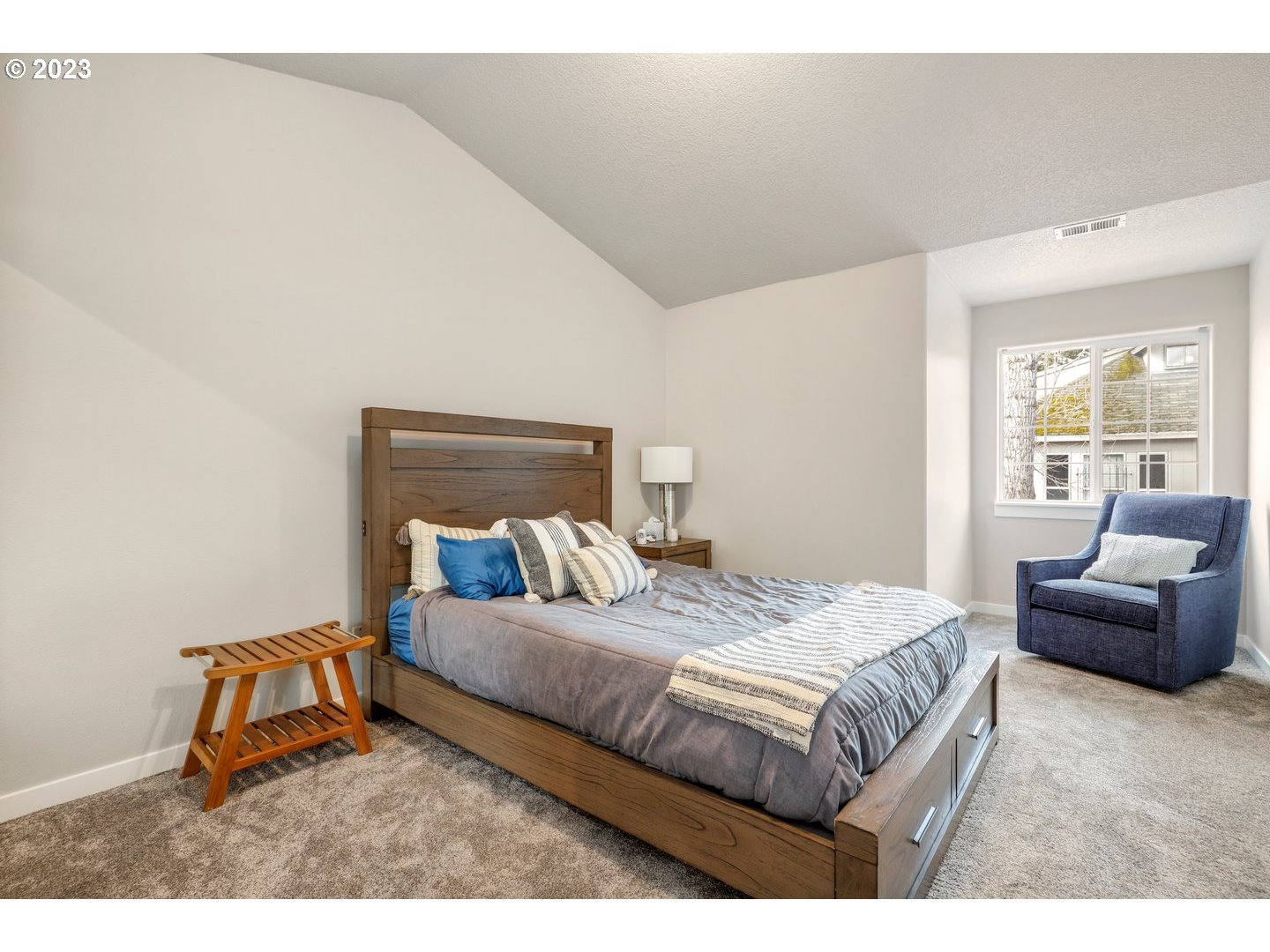 4114 Nicholson Road Vancouver, WA 98661 - Photo 27 of 28 a bedroom with a bed and a couch