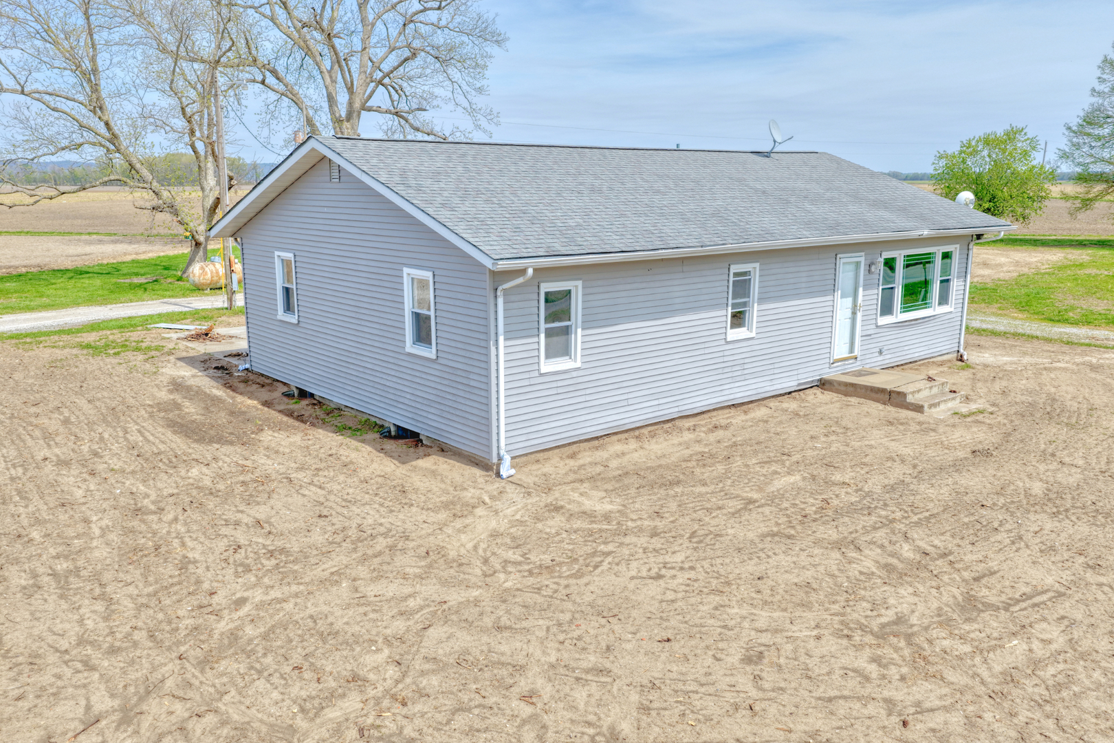 861 Indian Ridge Road Jacob, IL 62950 - Photo 38 of 42 a front view of a house with a yard and garage