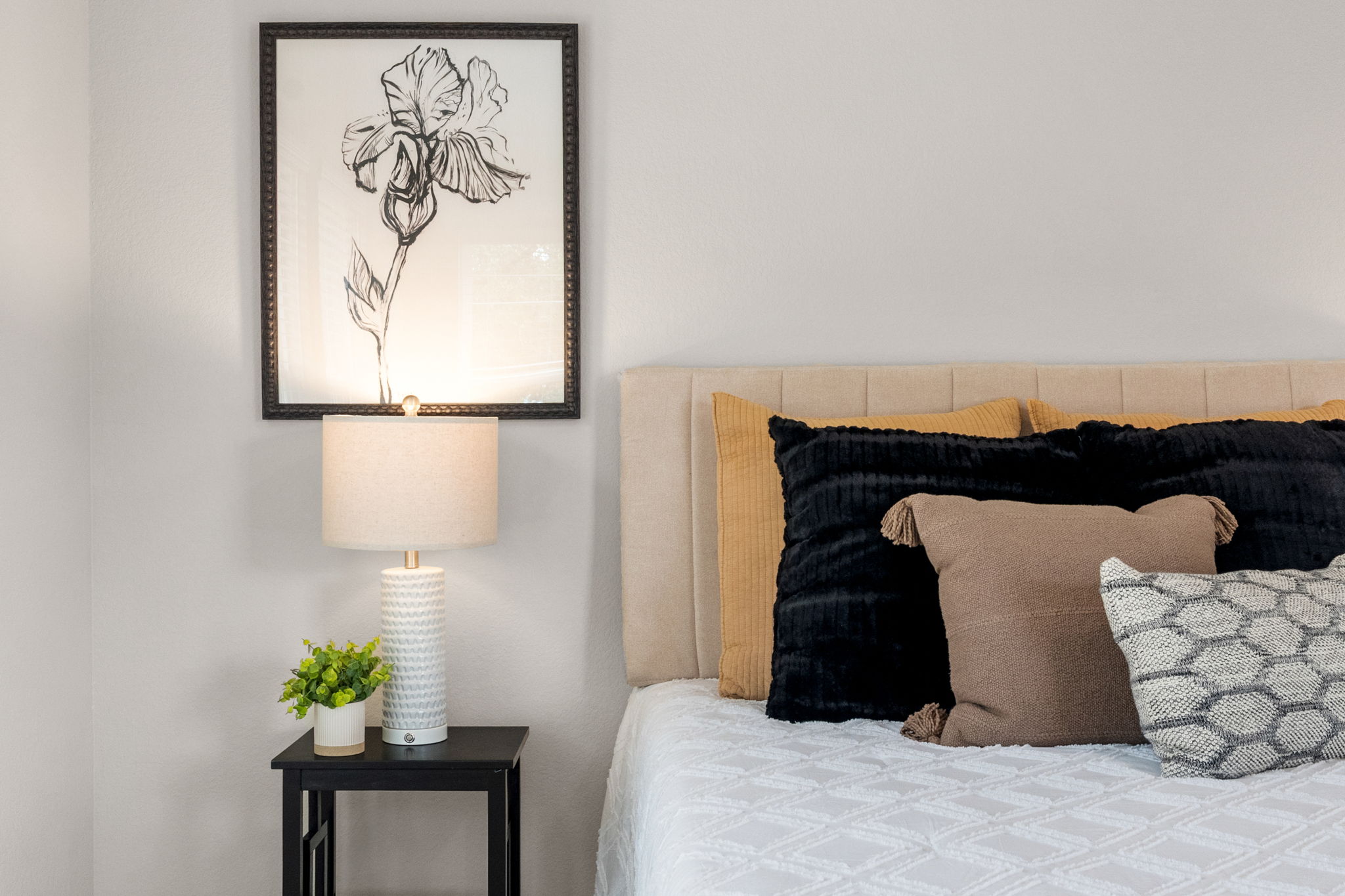 21701 Oregon Lane Leander, TX 78645 - Photo 21 of 31 a bedroom with a bed and a painting on the wall