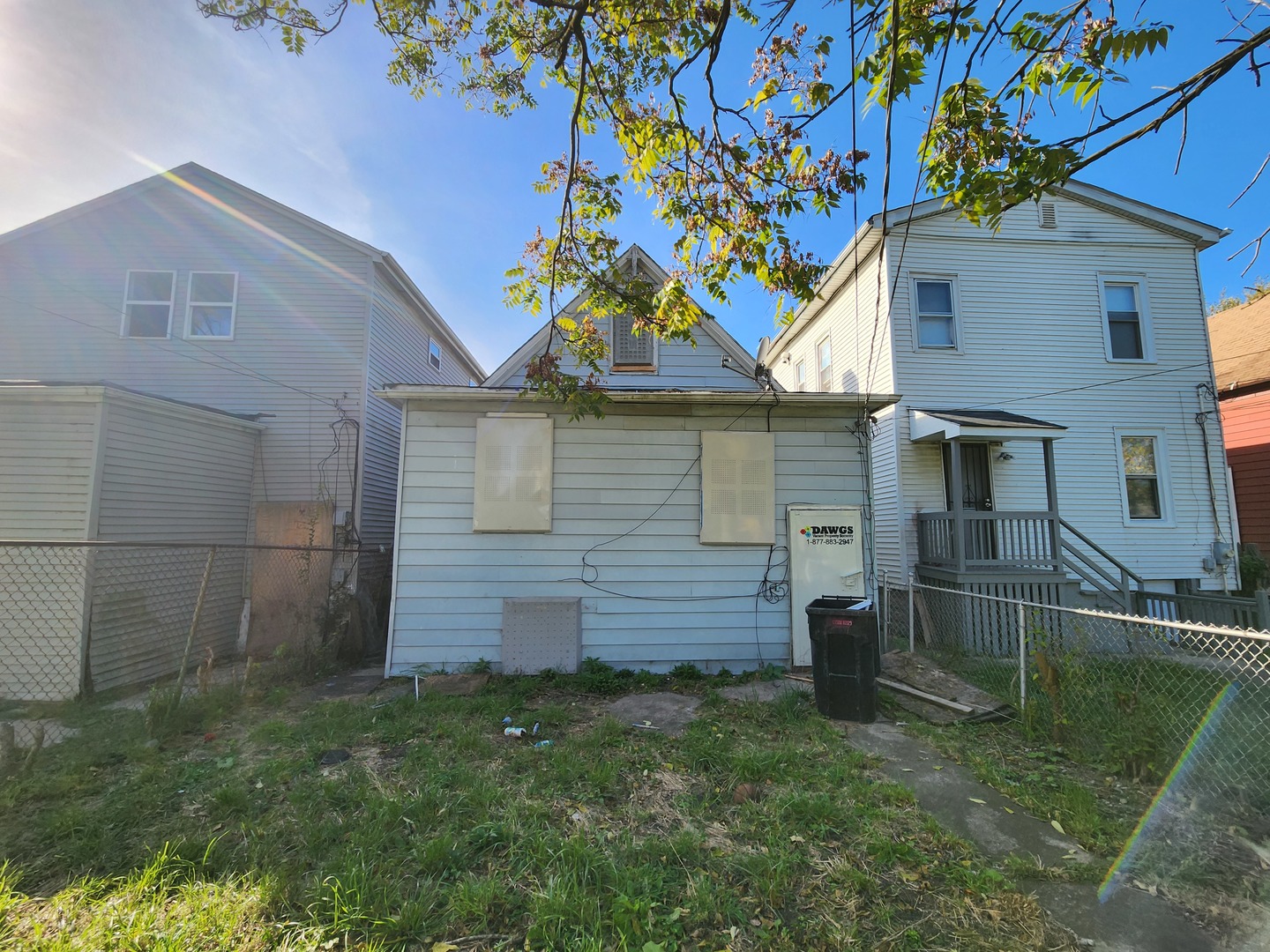10623 South Perry Avenue Chicago, IL 60628 - Photo 2 of 13 a backyard of a house with lots of green space