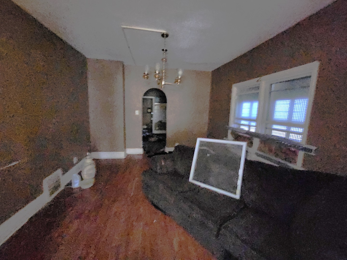 10623 South Perry Avenue Chicago, IL 60628 - Photo 8 of 13 a room with wooden floor and furniture