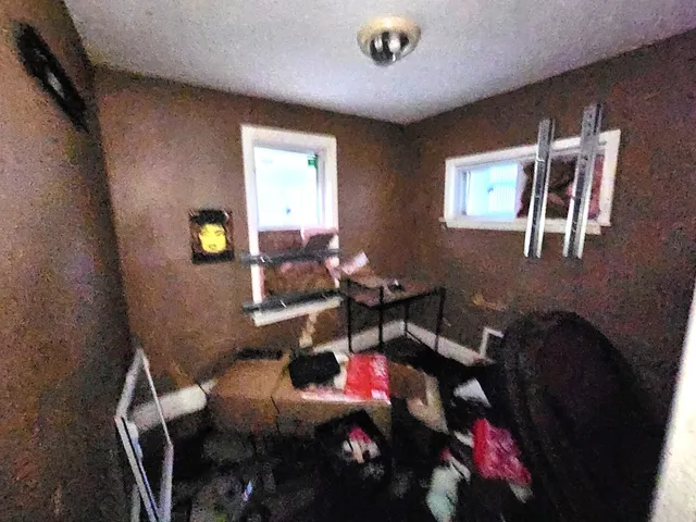 a view of a workspace with furniture