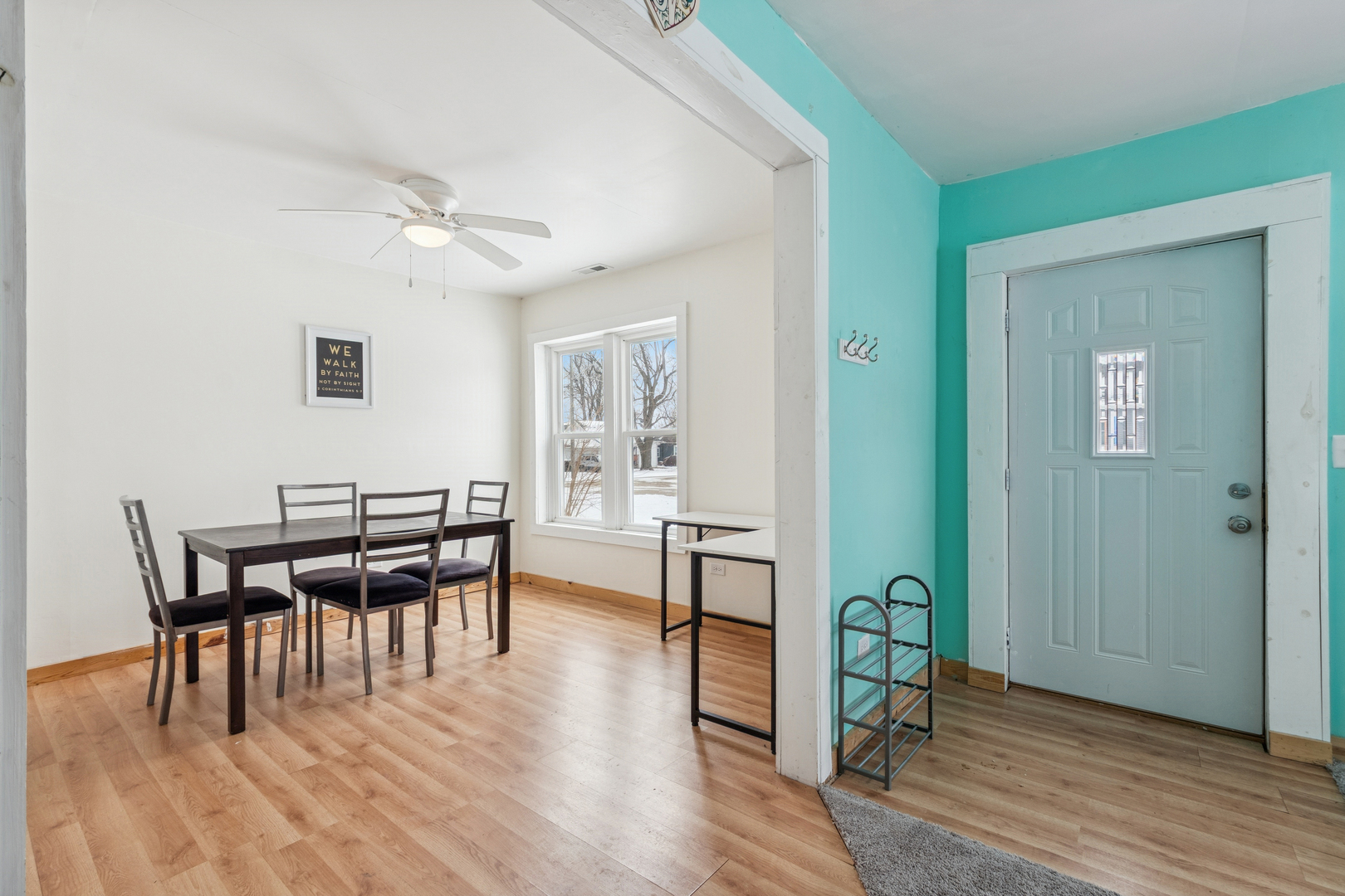 411 East Mazon Street Gardner, IL 60424 - Photo 5 of 21 a view of a livingroom with furniture and wooden floor