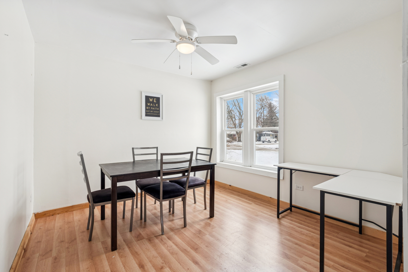 411 East Mazon Street Gardner, IL 60424 - Photo 6 of 21 a view of a dining room with furniture window and wooden floor