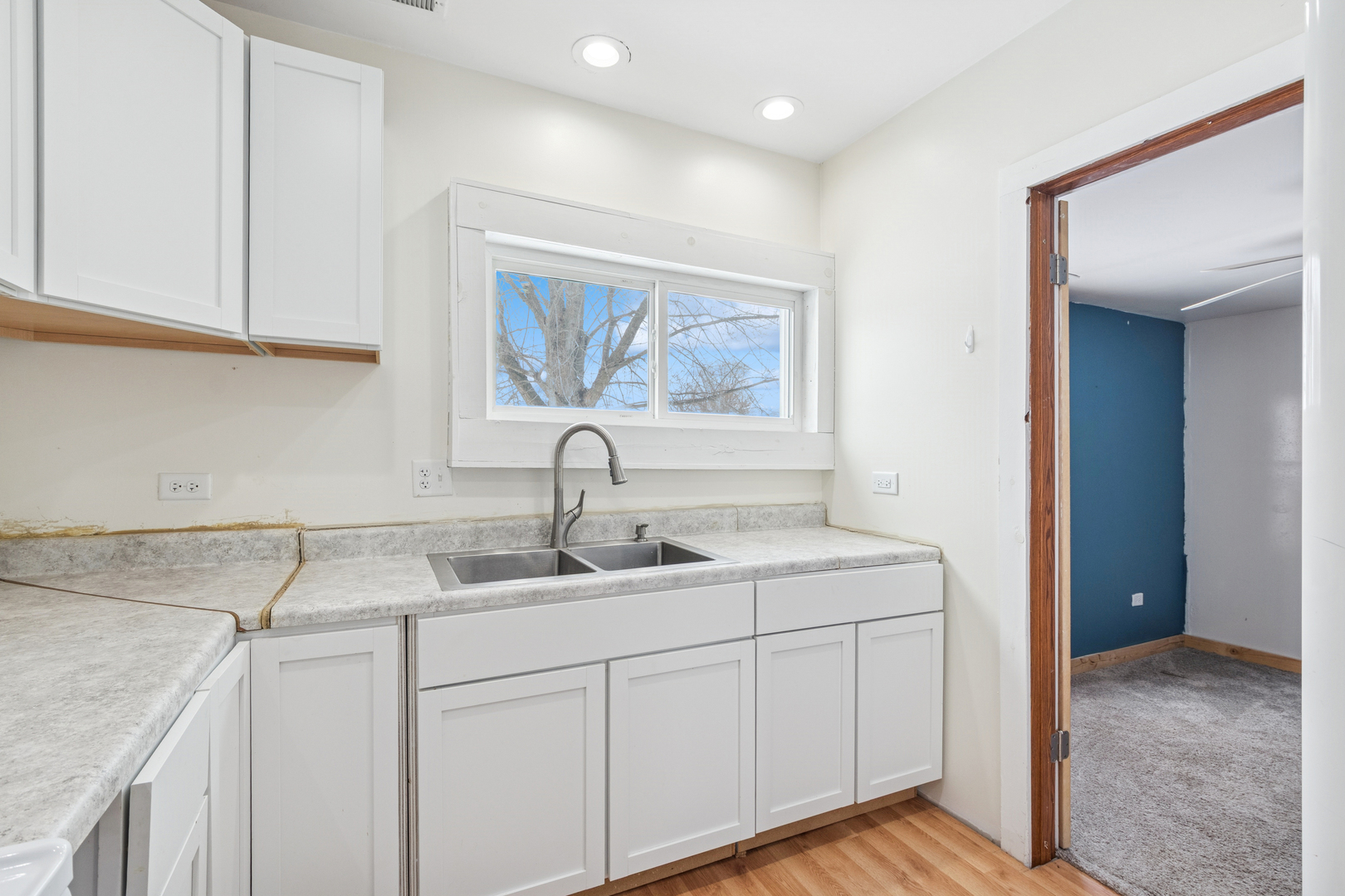 411 East Mazon Street Gardner, IL 60424 - Photo 9 of 21 a kitchen with a sink and cabinets