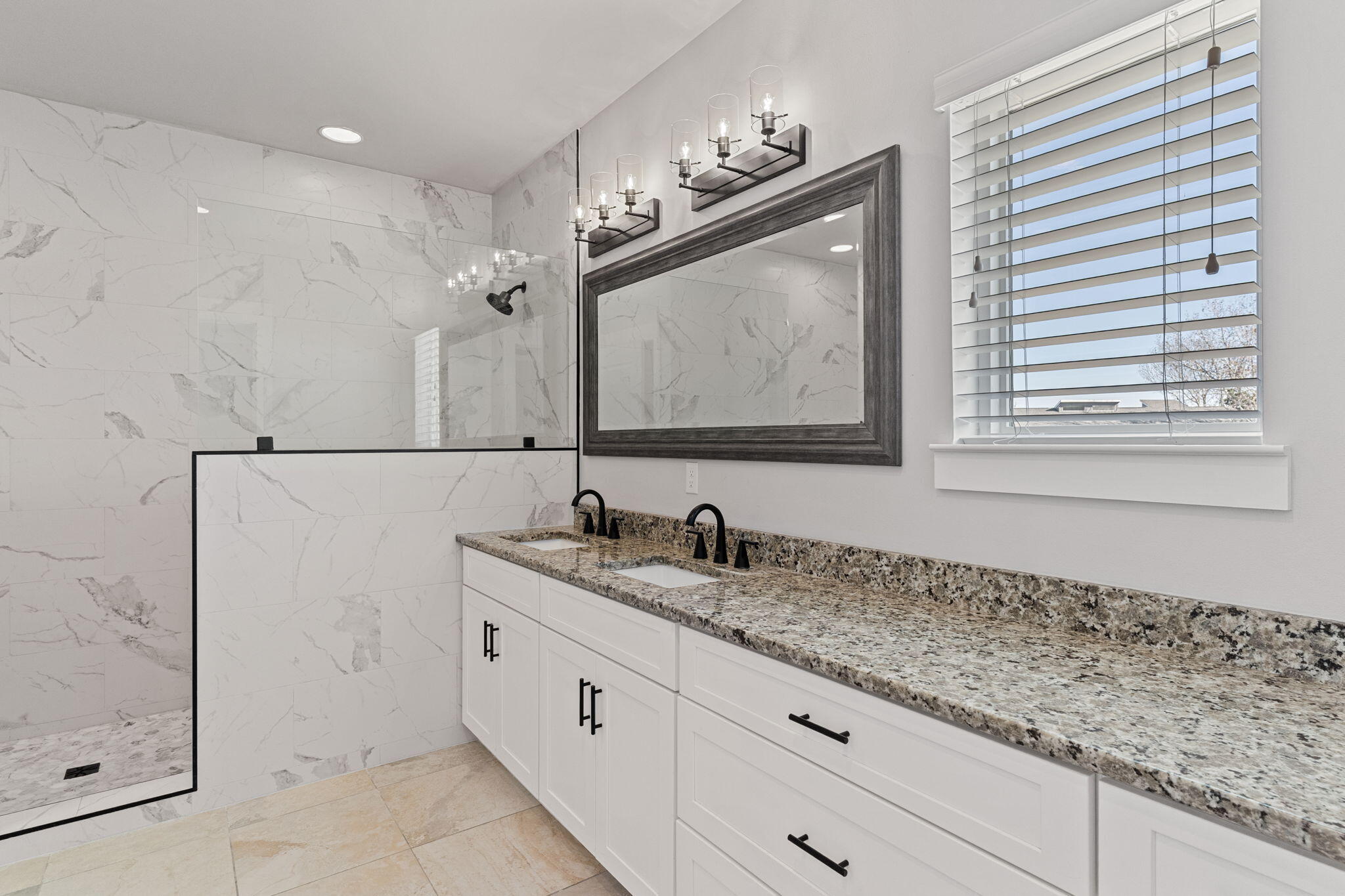 995 Airport Road, Unit 43 Destin, FL 32541 - Photo 20 of 40 a bathroom with a sink a vanity and a mirror