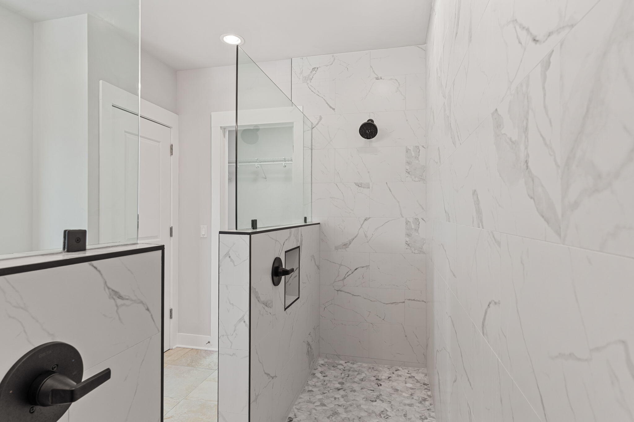 995 Airport Road, Unit 43 Destin, FL 32541 - Photo 21 of 40 a bathroom with a shower