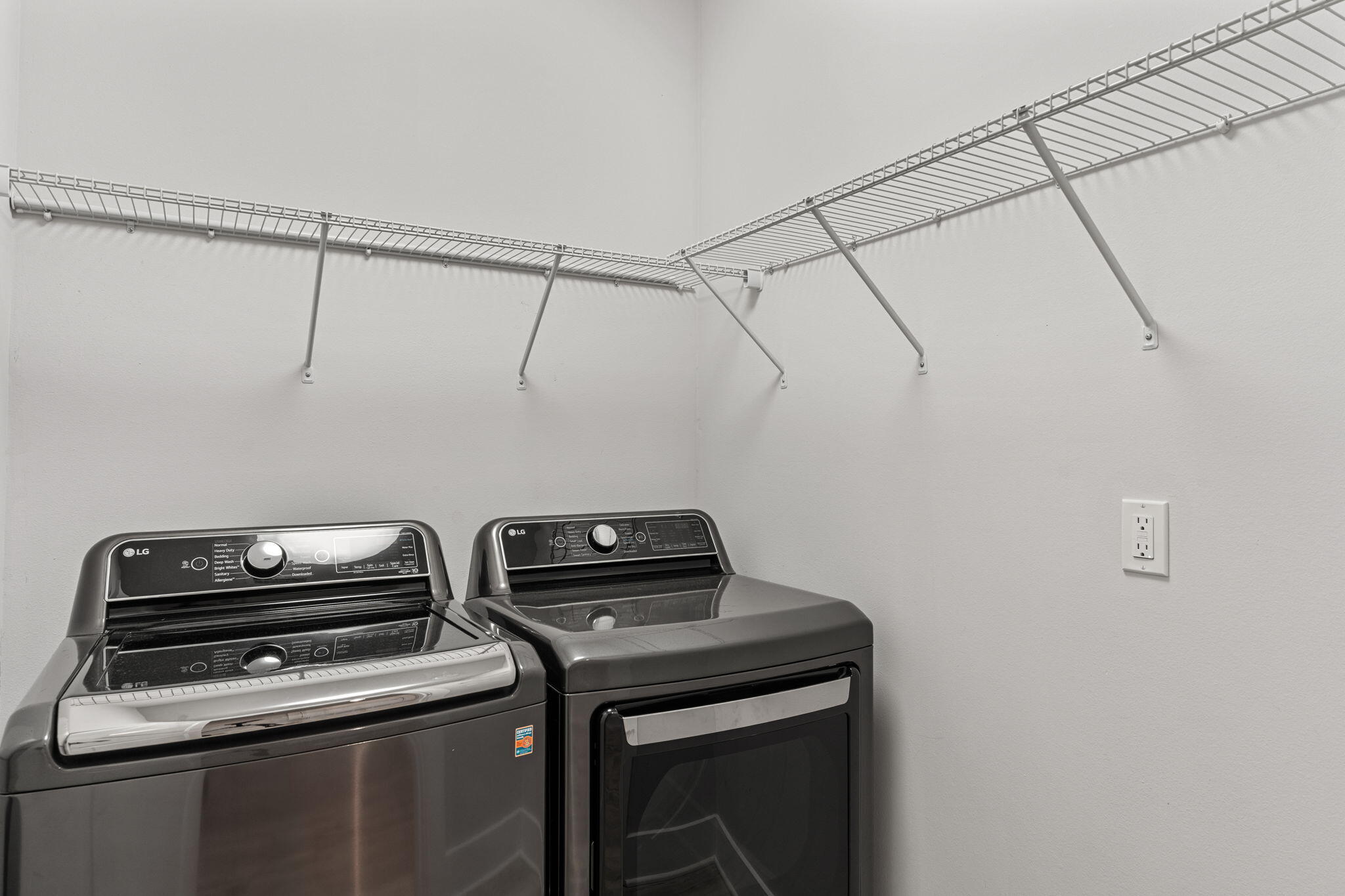 995 Airport Road, Unit 43 Destin, FL 32541 - Photo 22 of 40 a view of storage and utility room with racks on the wall