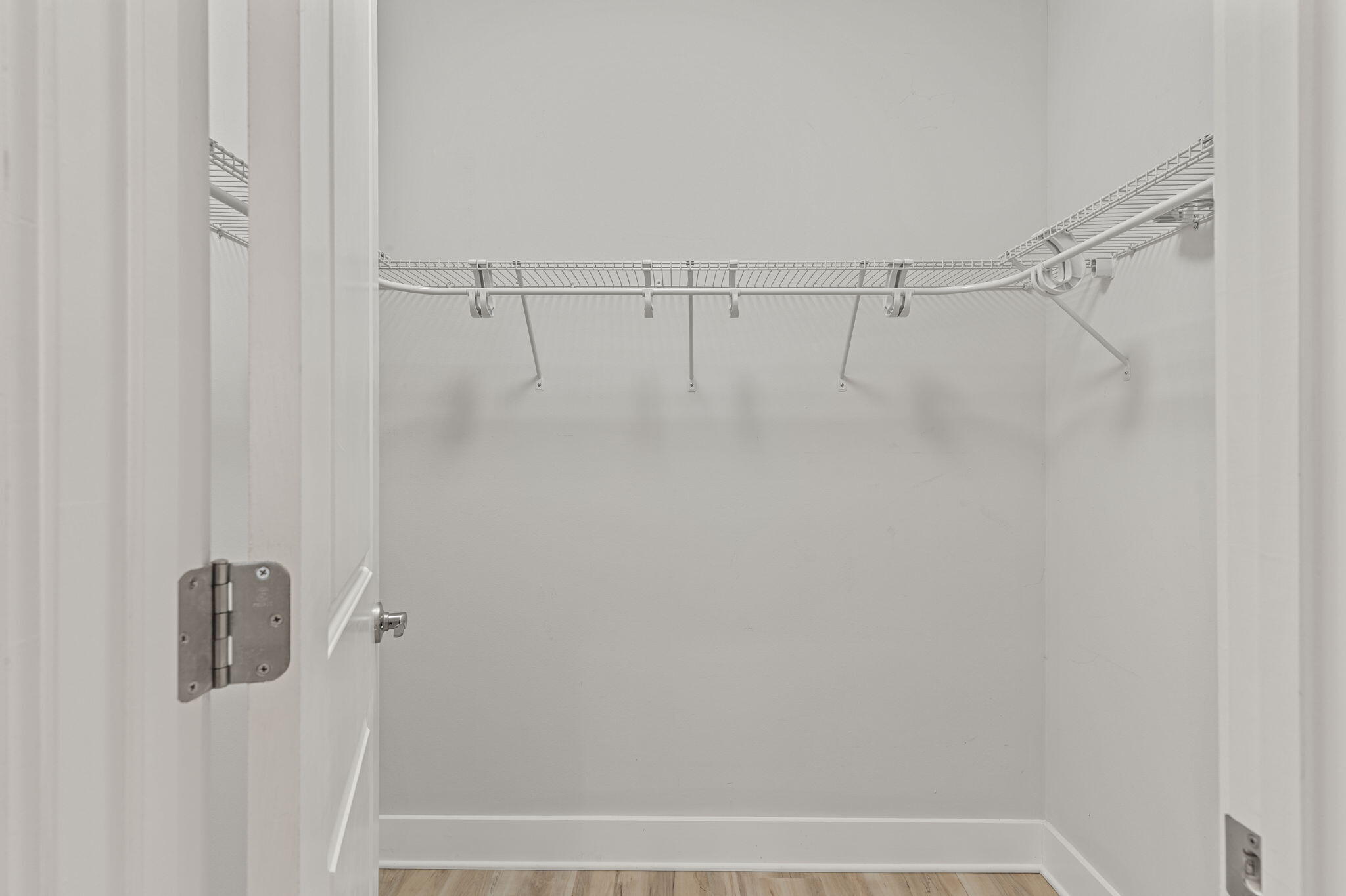 995 Airport Road, Unit 43 Destin, FL 32541 - Photo 34 of 40 a view of a room with racks on the wall