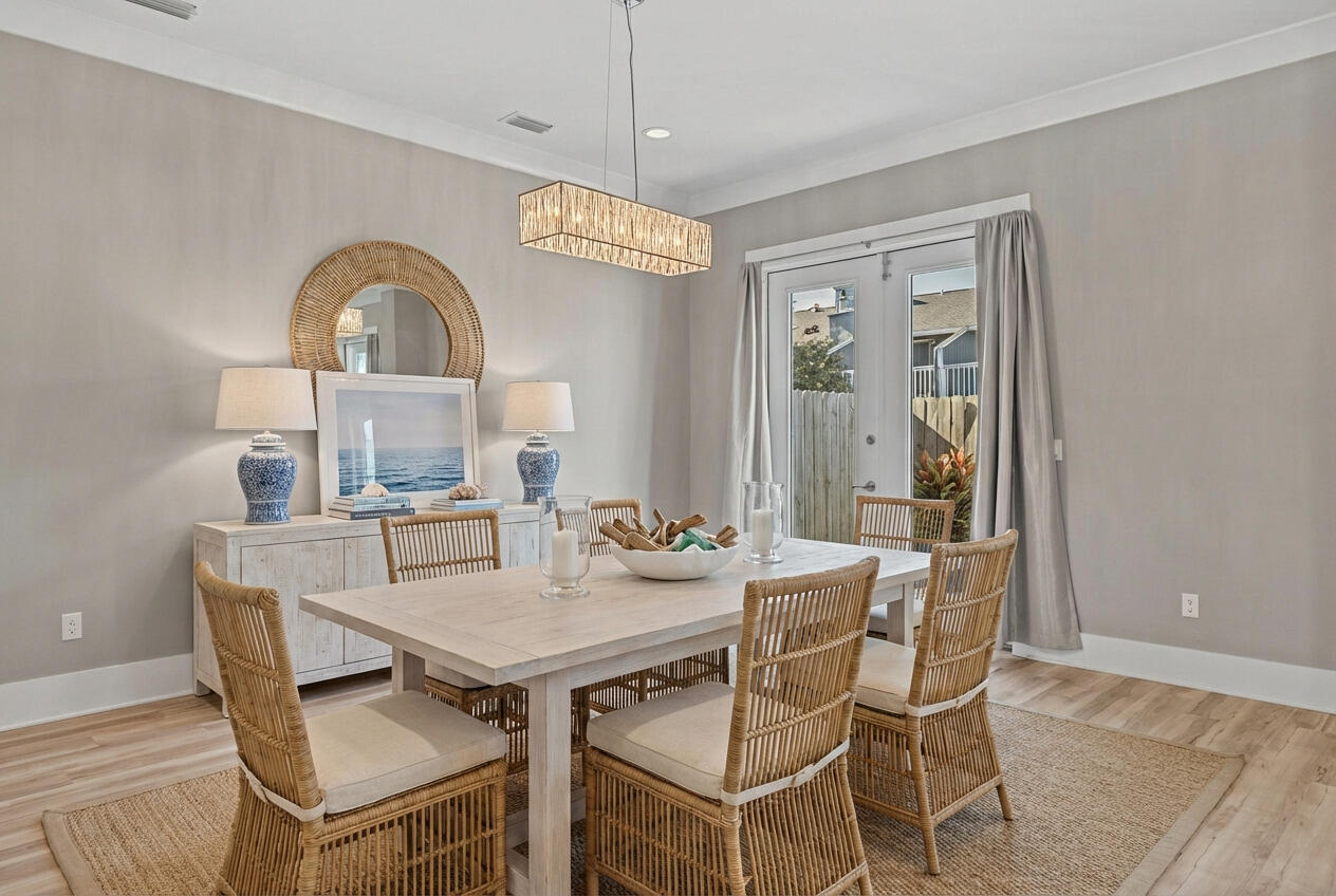 995 Airport Road, Unit 43 Destin, FL 32541 - Photo 7 of 40 a view of a dining room with furniture window and wooden floor