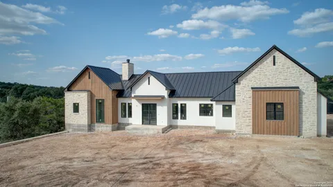 a front view of a house with yard