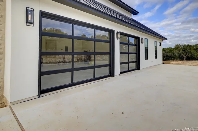 a view of an empty room with a balcony