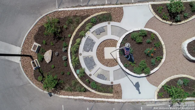 an aerial view of a house with garden
