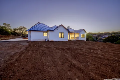 a house view with a garden space
