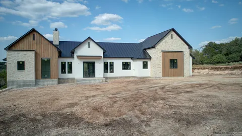 front view of a house and a yard