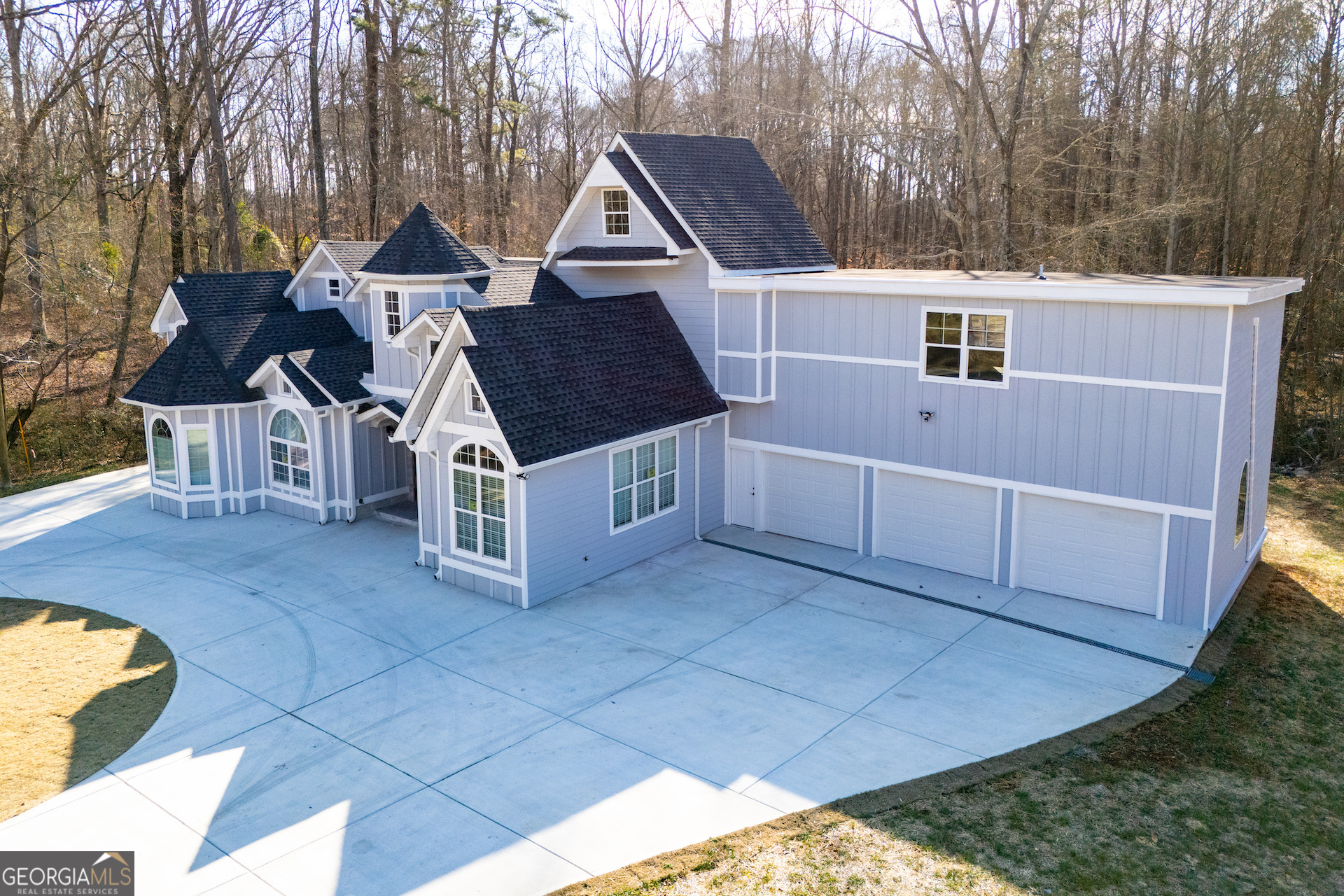 74 Jiles Road Carrollton, GA 30117 - Photo 121 of 130 a front view of a house with a yard and garage