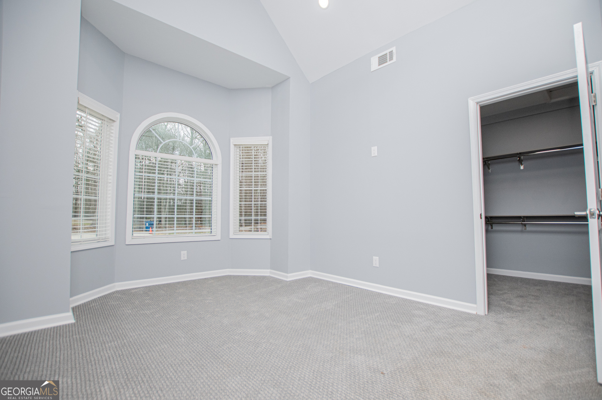 74 Jiles Road Carrollton, GA 30117 - Photo 45 of 130 an empty room with windows and closet