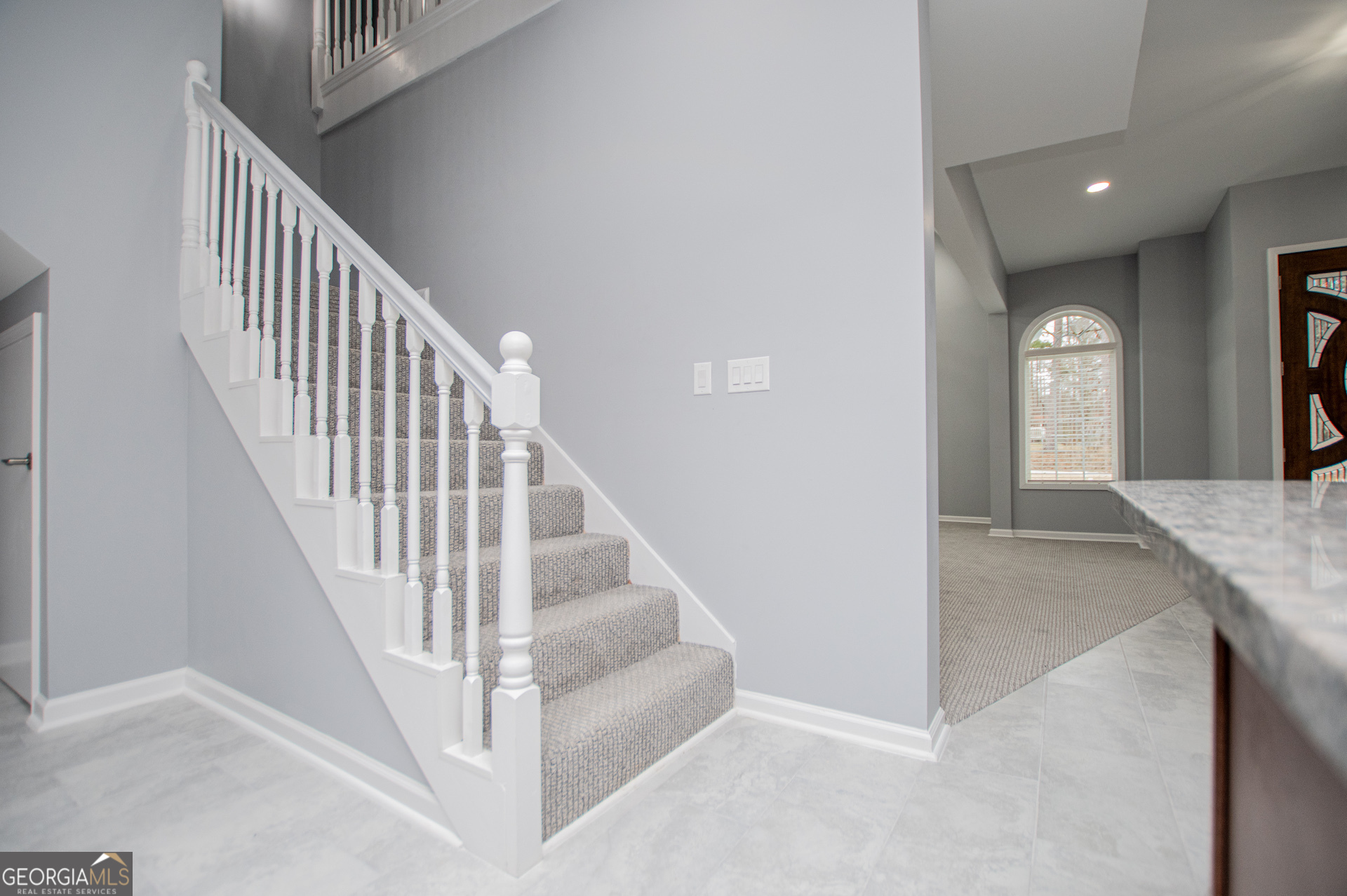 74 Jiles Road Carrollton, GA 30117 - Photo 46 of 130 a view of entryway and hall with wooden floor