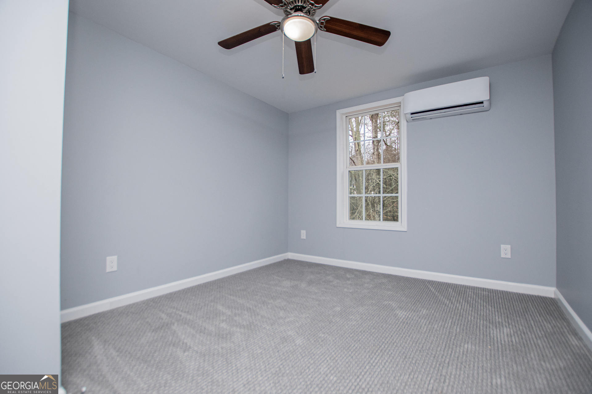 74 Jiles Road Carrollton, GA 30117 - Photo 59 of 130 a view of an empty room with a window