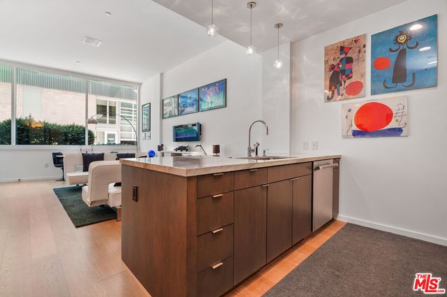 a very nice looking living room with a sink