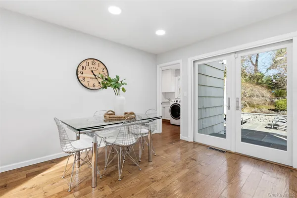 a view of entryway with wooden floor