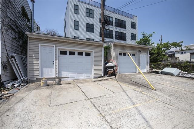 296 Paterson Plank Road Jersey City, NJ 07307 - Photo 8 of 13 a view of a white building
