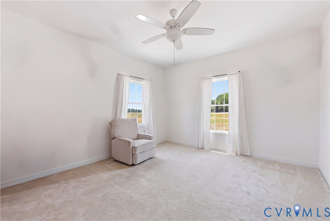 235 Stoney Point Road Cumberland, VA 23040 - Photo 29 of 35 an empty room with windows and closet