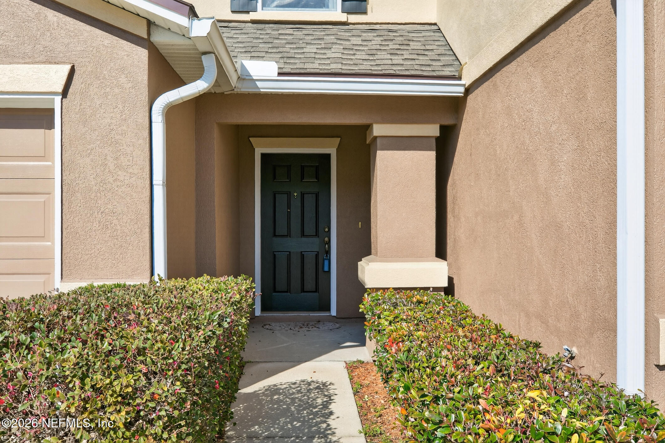 1500 Calming Water Drive, Unit 4603 Fleming Island, FL 32003 - Photo 10 of 98 a view of a porch